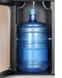 Bottom-load water bottle in cabinet